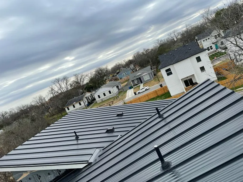 Standing seam metal roof panels with vents for Skylight Repair in Yonkers